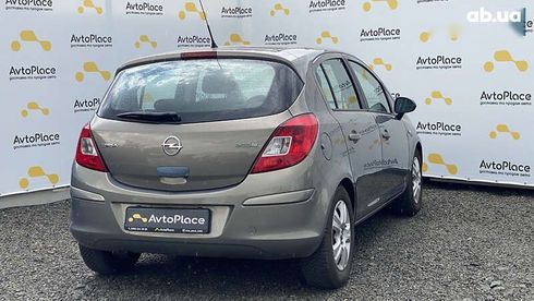 Opel Corsa 2011 - фото 26