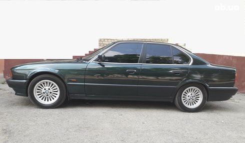 BMW 5 серия 1994 зеленый - фото 2