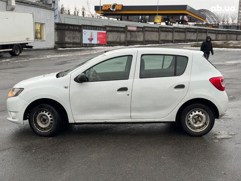 Dacia Sandero 2014 белый - фото 8