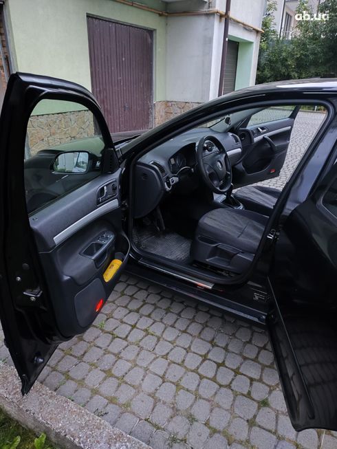 Skoda Octavia 2006 черный - фото 14