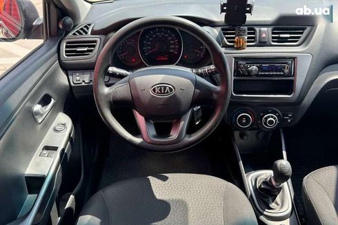 Kia Rio 2012 - фото 14