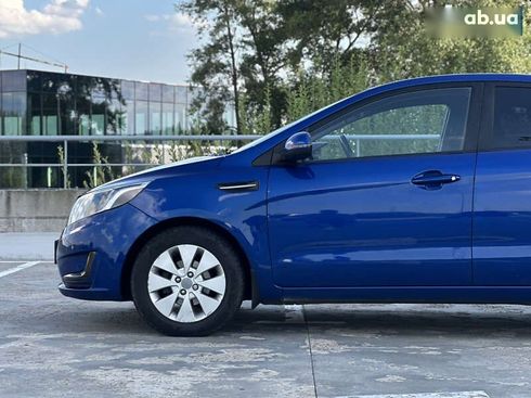 Kia Rio 2013 - фото 13