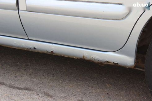 Nissan Almera 2005 - фото 9