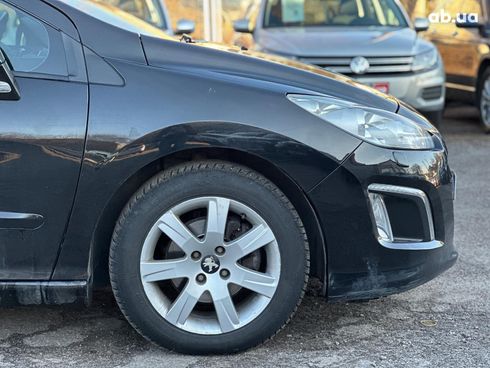 Peugeot 308 2011 черный - фото 17