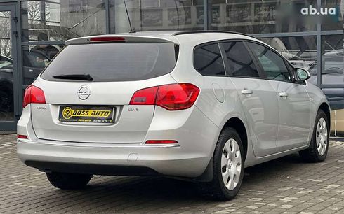 Opel Astra 2014 - фото 6