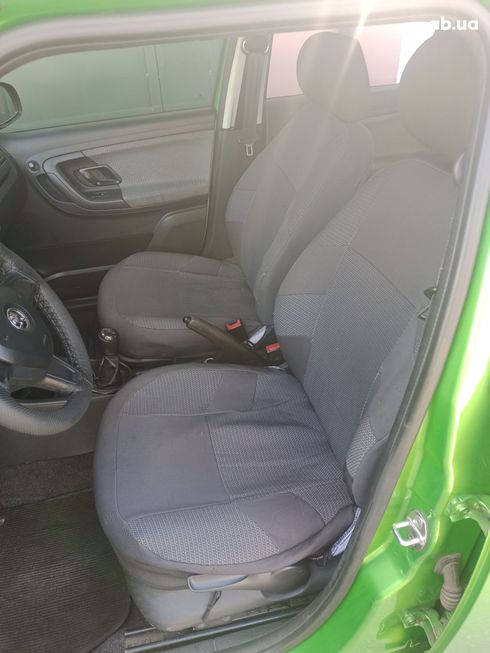 Skoda Fabia 2014 зеленый - фото 19
