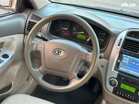 Kia Cerato 2007 бежевый - фото 24