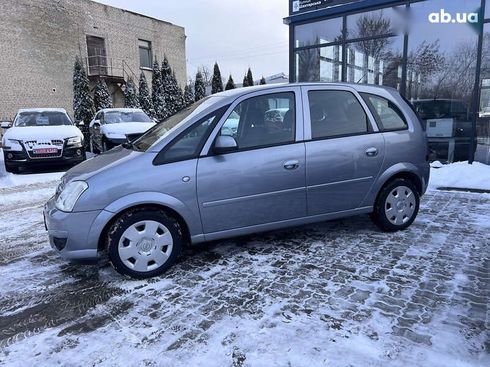 Opel Meriva 2009 - фото 9