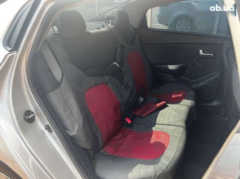 Kia Rio 2013 - фото 18