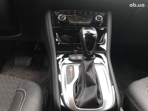 Opel Astra 2016 коричневый - фото 24