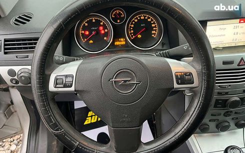 Opel Astra 2009 - фото 11