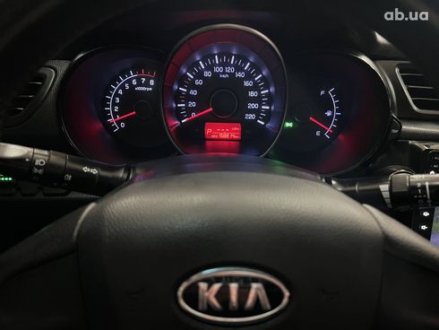 Kia Rio 2012 серебристый - фото 9