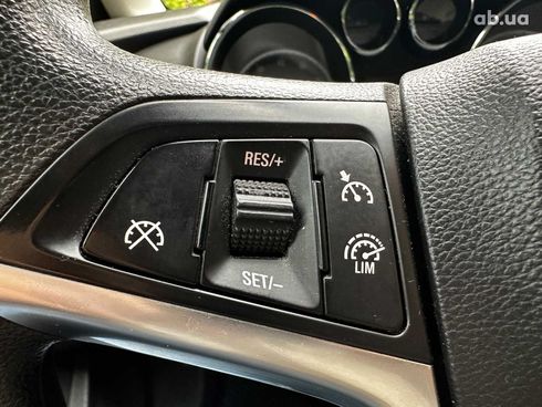 Opel Astra 2012 черный - фото 13