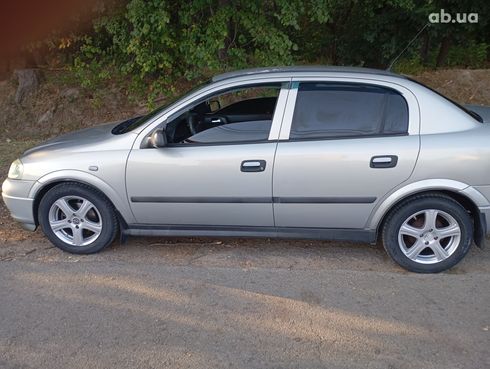 Opel Astra G 2008 серебристый - фото 2