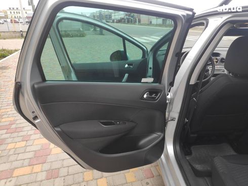 Peugeot 308 2010 серый - фото 9