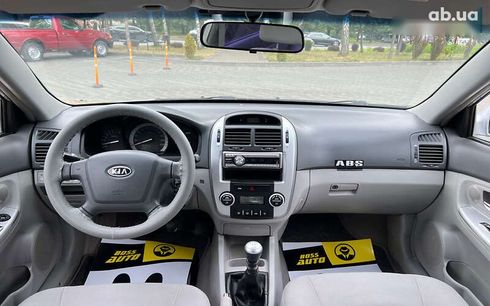 Kia Cerato 2007 - фото 12