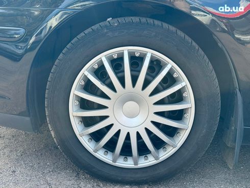 Toyota Avensis 2007 черный - фото 29