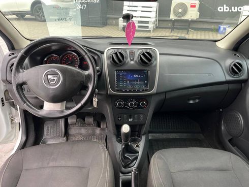 Dacia Logan 2015 белый - фото 8