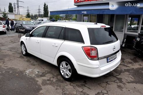 Opel Astra 2010 - фото 19