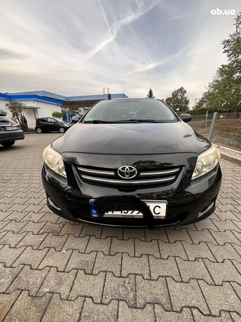 Toyota Corolla 2008 черный - фото 2