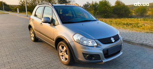 Suzuki SX4 2011 серебристый - фото 3