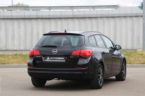 Opel Astra 2011 - фото 4