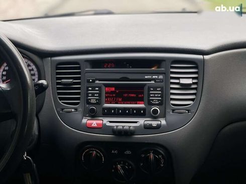 Kia Rio 2011 - фото 17