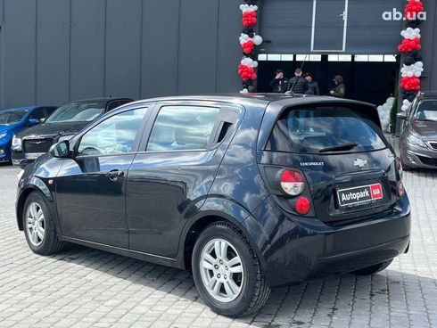 Chevrolet Aveo 2011 черный - фото 7