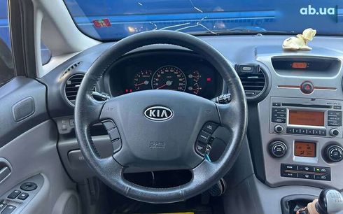 Kia Carens 2009 - фото 14