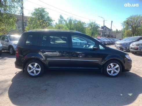 Volkswagen Touran 2009 черный - фото 4