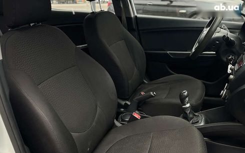 Kia Rio 2012 - фото 13