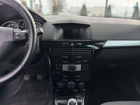 Opel Astra 2010 - фото 29