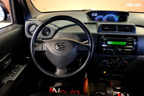 Daihatsu Materia 2008 вишневый - фото 7