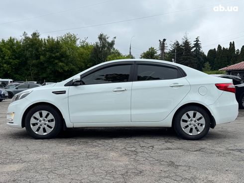 Kia Rio 2013 белый - фото 6