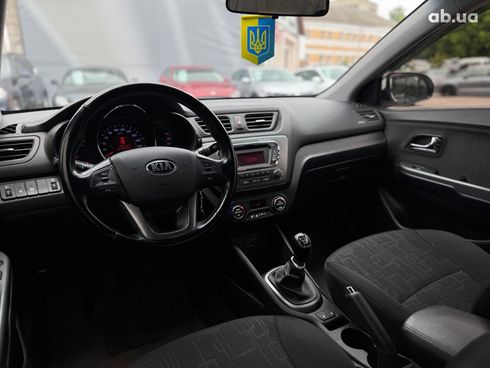 Kia Rio 2013 белый - фото 37