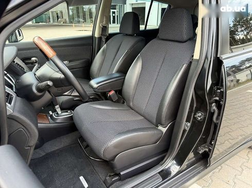 Nissan Tiida 2011 - фото 28