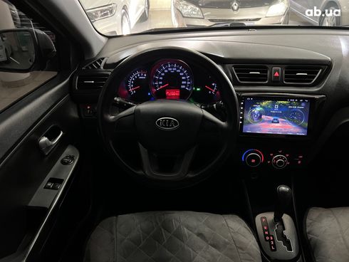 Kia Rio 2012 серебристый - фото 5