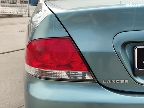 Mitsubishi Lancer 2008 серый - фото 7