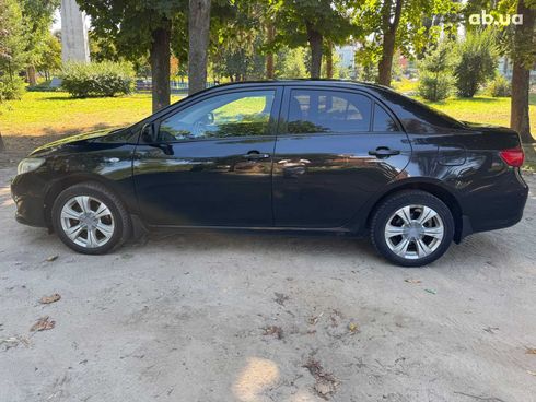 Toyota Corolla 2007 черный - фото 8