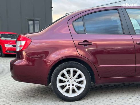 Suzuki SX4 2010 красный - фото 7