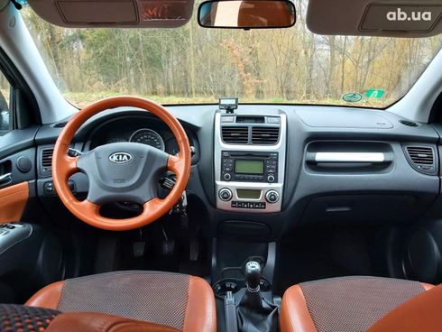 Kia Sportage 2010 черный - фото 2