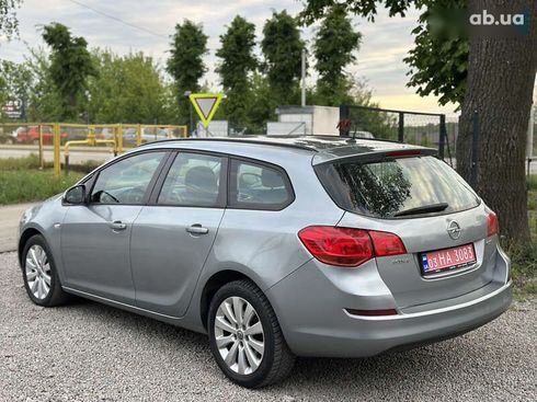 Opel Astra 2010 - фото 17
