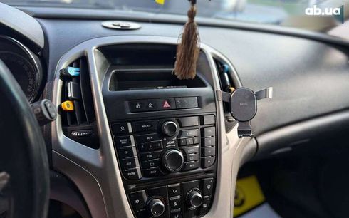 Opel Astra 2011 - фото 14