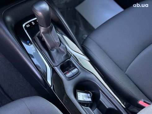 Toyota Corolla 2021 белый - фото 33