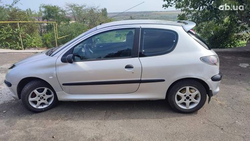 Peugeot 206 2002 серебристый - фото 18