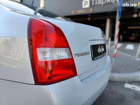 Nissan Primera 2007 - фото 14