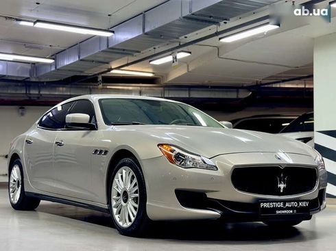 Maserati Quattroporte 2013 - фото 13