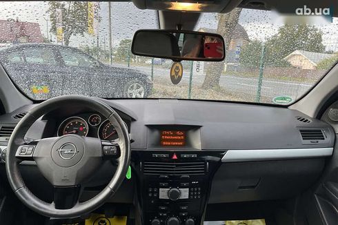 Opel Astra 2010 - фото 22
