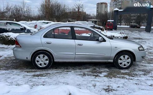 Nissan Almera 2011 - фото 7