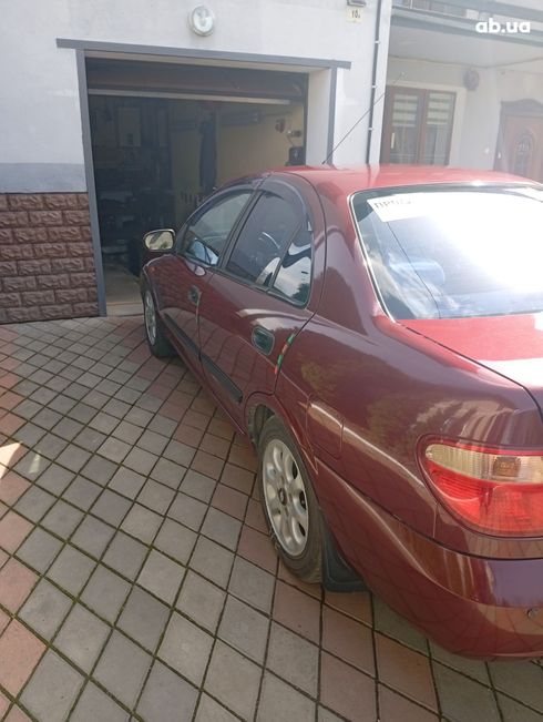 Nissan Almera 2004 вишневый - фото 7